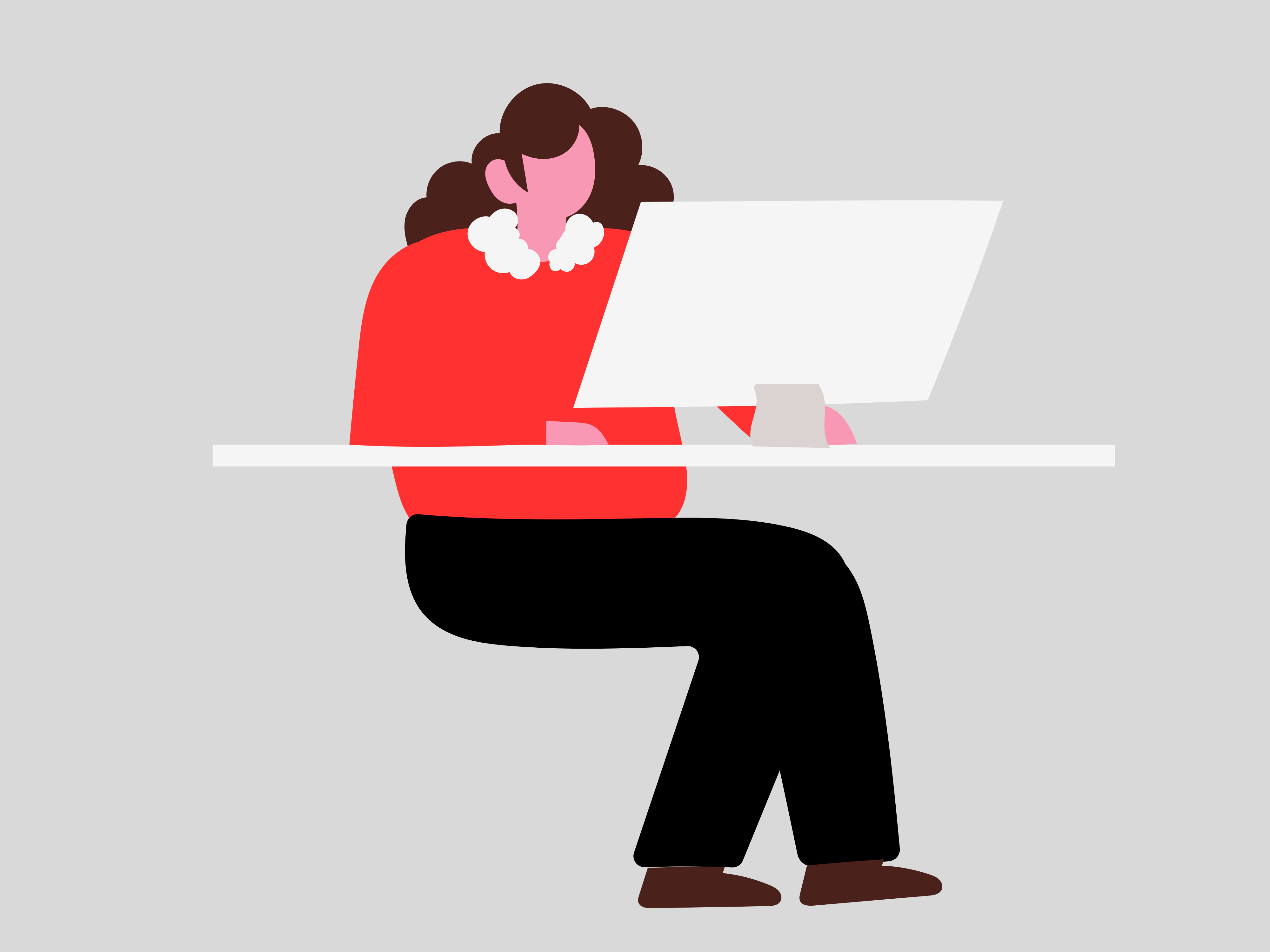 Woman sitting at a laptop